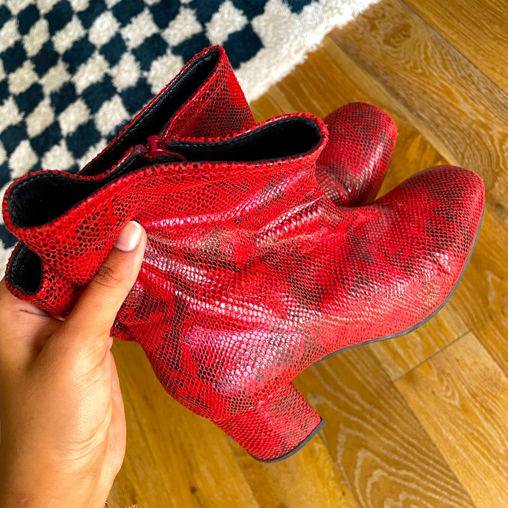 Red faux snakeskin boots